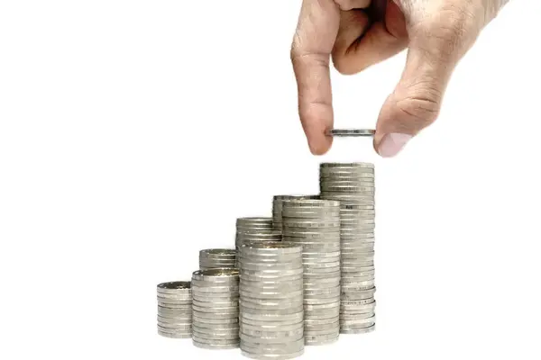 İş büyüme kavramı, Finansal büyüme, Man's el sikke yığını üzerinde para sikke koymak, sikke yığınları artan, Bütçe Planlama