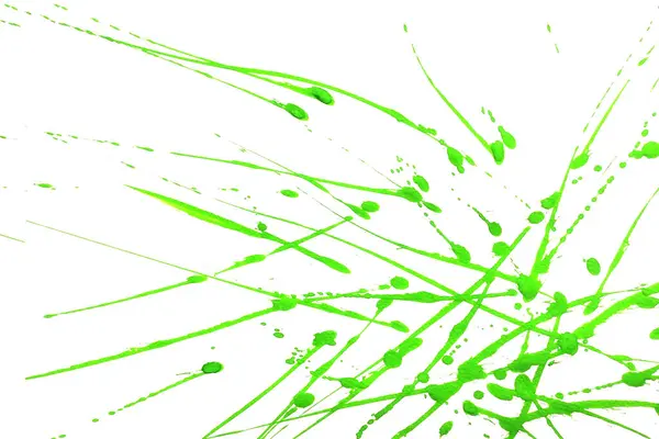 Yeşil suluboya ya da mürekkep desenleri beyaz arkaplan üzerinde sıçrama ve çizgiler, soyut suluboya