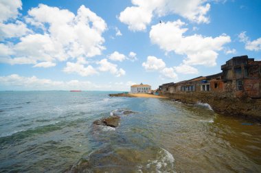 Salvador, Bahia - Brazil - September 30, 2024: View from the sea to the Monastery of Our Lady of Mont Serrat in Salvador, with clear sky and clouds. clipart