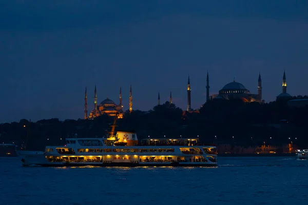 stock image Turkey, Istanbul, local highspeed ferry or sea bus shuttles commuters and tourists along the Bosphorus section of waterways. Blue Mosque, Hagia Sophia, and Topkapi Palace in background.