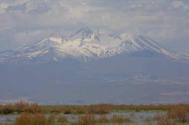 Erciyes Mount with height of 3,864 metres is the highest mountain in Cappadocia and central Anatolia. It is a volcano. 