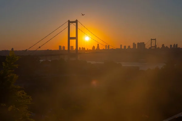 stock image Awesome Panoramic view of Istanbul Bosphorus on sunset. Istanbul Bosphorus Bridge (15 July Martyrs Bridge. Turkish: 15 Temmuz Sehitler Koprusu). Beautiful landscape Turkey.