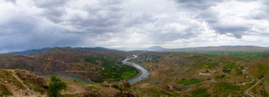 The old Palu Bridge and Black train interlocking iron bridge over the Murat River.