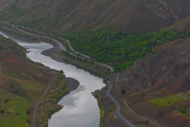 The old Palu Bridge and Black train interlocking iron bridge over the Murat River.