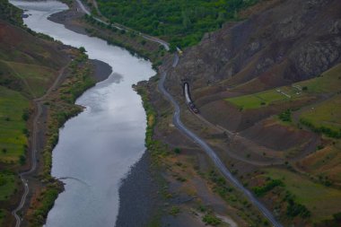 The old Palu Bridge and Black train interlocking iron bridge over the Murat River.