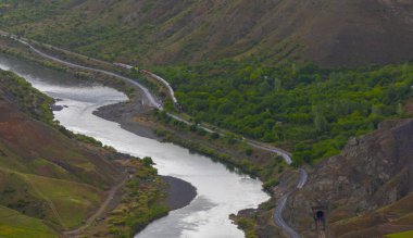 The old Palu Bridge and Black train interlocking iron bridge over the Murat River.