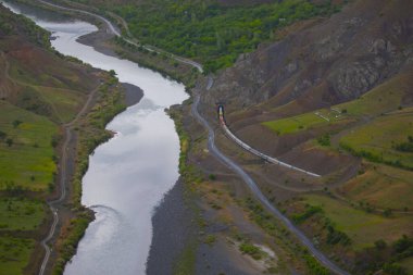 The old Palu Bridge and Black train interlocking iron bridge over the Murat River.