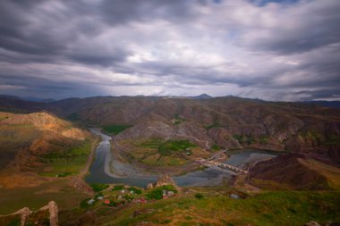 The old Palu Bridge and Black train interlocking iron bridge over the Murat River.