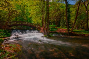 A bridge over the river in Vrelo Bosne park in Bosnia Herzegovina