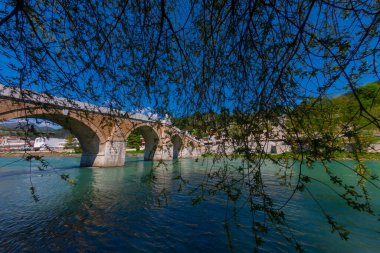 The Mehmed Pasha Sokolovic Bridge is a historic bridge in Visegrad, over the Drina River in eastern Bosnia and Herzegovina. The bridge is a UNESCO World Heritage Site.
