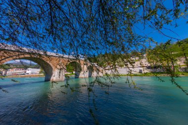 The Mehmed Pasha Sokolovic Bridge is a historic bridge in Visegrad, over the Drina River in eastern Bosnia and Herzegovina. The bridge is a UNESCO World Heritage Site.