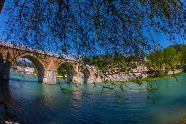The Mehmed Pasha Sokolovic Bridge is a historic bridge in Visegrad, over the Drina River in eastern Bosnia and Herzegovina. The bridge is a UNESCO World Heritage Site.