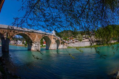 The Mehmed Pasha Sokolovic Bridge is a historic bridge in Visegrad, over the Drina River in eastern Bosnia and Herzegovina. The bridge is a UNESCO World Heritage Site.