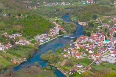 Aerial drone view Bihac and Una river in Bosnia and Herzegovina. Buildings, streets and residential houses. Biha is a town and municipality in western BiH.