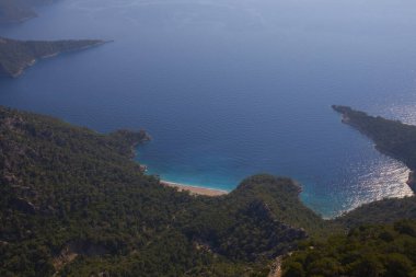 Noon hours on the lush, rugged mountainous coastline near Fethiye and Butterfly Valley, (yediburunlar bay) Turkey