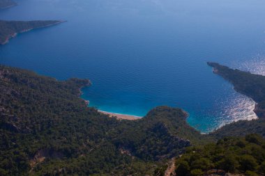 Noon hours on the lush, rugged mountainous coastline near Fethiye and Butterfly Valley, (yediburunlar bay) Turkey