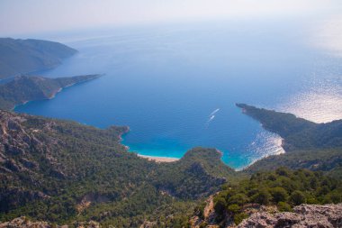 Noon hours on the lush, rugged mountainous coastline near Fethiye and Butterfly Valley, (yediburunlar bay) Turkey