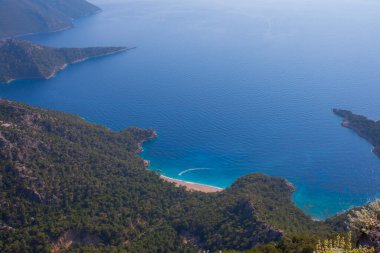 Noon hours on the lush, rugged mountainous coastline near Fethiye and Butterfly Valley, (yediburunlar bay) Turkey