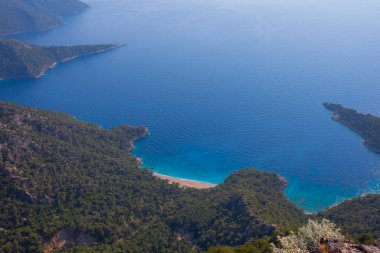 Noon hours on the lush, rugged mountainous coastline near Fethiye and Butterfly Valley, (yediburunlar bay) Turkey