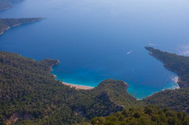 Noon hours on the lush, rugged mountainous coastline near Fethiye and Butterfly Valley, (yediburunlar bay) Turkey