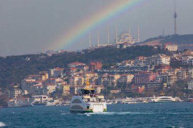Panoramic view of the Anatolian side of the bosphorus taken across the strait from European side. Photo features, sea, Camlica mosque, ferry, Camlica tower,