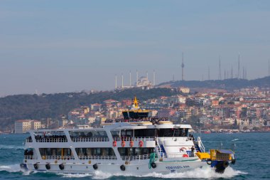 Panoramic view of the Anatolian side of the bosphorus taken across the strait from European side. Photo features, sea, Camlica mosque, ferry, Camlica tower,