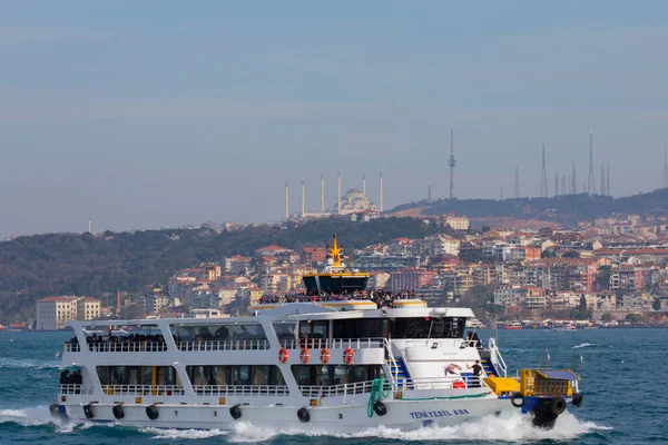 Panoramic view of the Anatolian side of the bosphorus taken across the strait from European side. Photo features, sea, Camlica mosque, ferry, Camlica tower,
