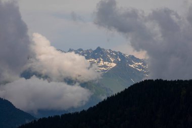 Beautiful panorama of snow-capped Kackar Mountains. Landscape photo shot at The Kackar Mountains located in the Eastern Black Sea Region of Turkey.