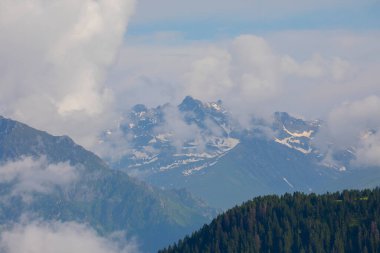 Beautiful panorama of snow-capped Kackar Mountains. Landscape photo shot at The Kackar Mountains located in the Eastern Black Sea Region of Turkey.