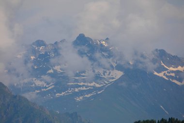 Beautiful panorama of snow-capped Kackar Mountains. Landscape photo shot at The Kackar Mountains located in the Eastern Black Sea Region of Turkey.
