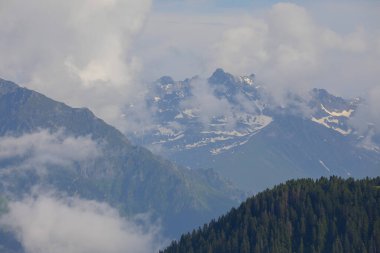 Beautiful panorama of snow-capped Kackar Mountains. Landscape photo shot at The Kackar Mountains located in the Eastern Black Sea Region of Turkey.