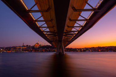 Long exposure aesthetic view of Halic Metro Bridge during the twilight
