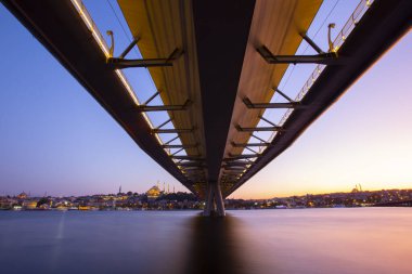 Long exposure aesthetic view of Halic Metro Bridge during the twilight