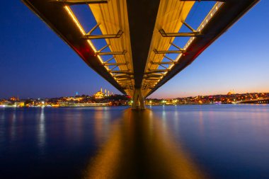 Long exposure aesthetic view of Halic Metro Bridge during the twilight