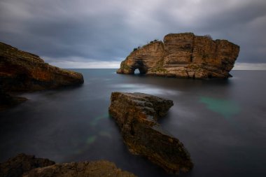 Interesting elephant-like rock in Sardala Bay. Long exposure shot in the morning. Kocaeli, Turkey.