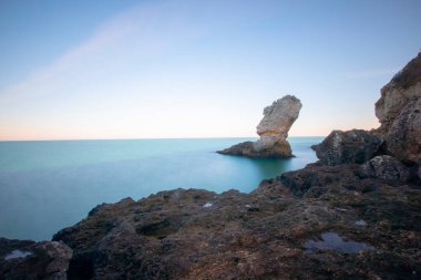 In the middle of a large stone sea, photographed with long exposure technique