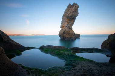 In the middle of a large stone sea, photographed with long exposure technique