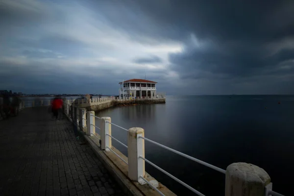 stock image Dramatic long exposure view of Moda pier on a cloudy and windy day in Istanbul