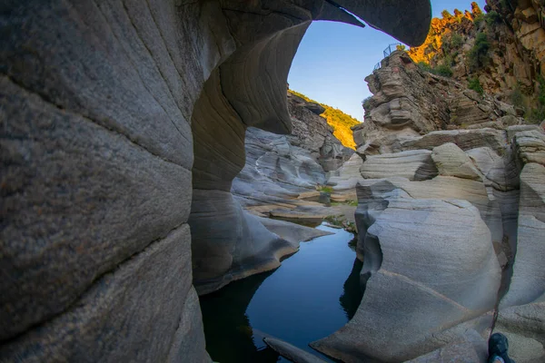 stock image Tasyaran canyon, which attracts attention with its rock shapes similar to Antelope canyon in Arizona, offers a magnificent view to its visitors. Canyon view and stream at sunset.