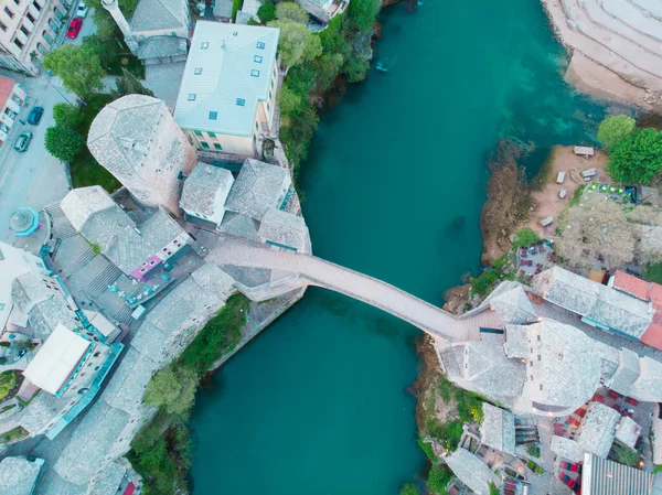 stock image Aerial Mostar Bridge and Koski Mehmed Pasha Mosque drone view of the historical city of Mostar, Ottoman architecture view of Bosnia is the most beautiful city in Europe