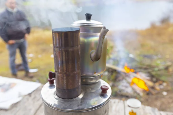 Stock image Turkish samovar outdoor. Preparing tea outside on the nature on double pot on the fire.