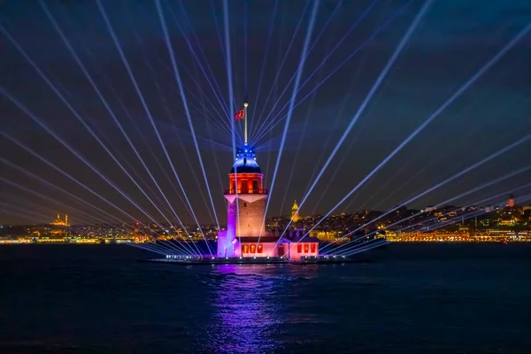 stock image Istanbul Maiden Tower New (yeni kz kulesi), with a colorful and light show after restoration. The historical building is best touristic destination Istanbul. Maiden's Tower famous travel destination.