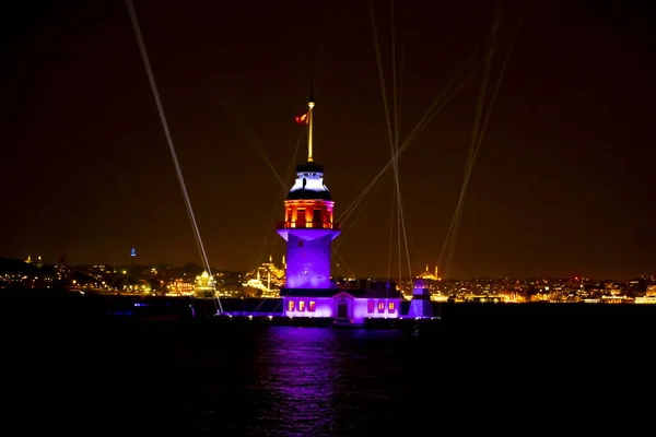stock image Istanbul Maiden Tower New (yeni kz kulesi), with a colorful and light show after restoration. The historical building is best touristic destination Istanbul. Maiden's Tower famous travel destination.