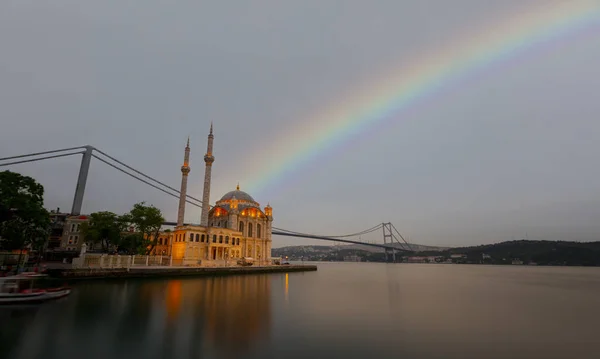 stock image Ortakoy Mosque and Bosphorus bridge in Istanbul at sunrise, Turkey