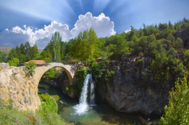 Turkey's waterfalls and rivers. Historic stone bridge and waterfall. Clandras bridge and Clandras waterfall. Usak , Turkey
