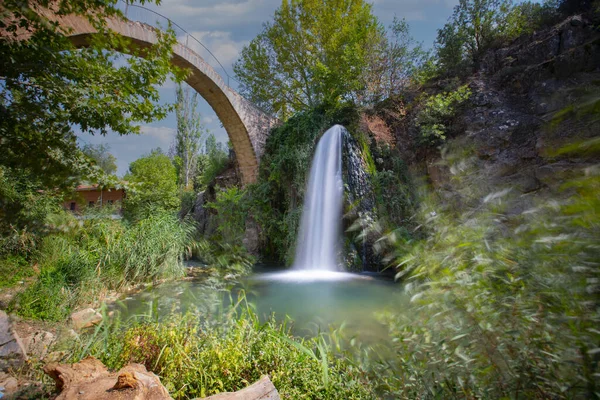 Turkey\'s waterfalls and rivers. Historic stone bridge and waterfall. Clandras bridge and Clandras waterfall. Usak , Turkey