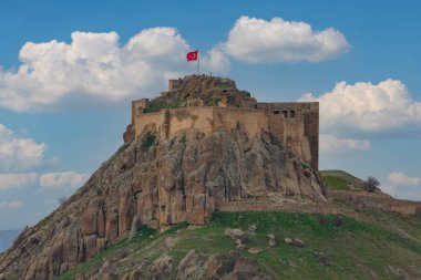 Pertek castle (Pertek kalesi) located in Pertek district of Tunceli province and bearing the name of the district is located on a mountain in the middle of Keban Dam (Keban baraji).