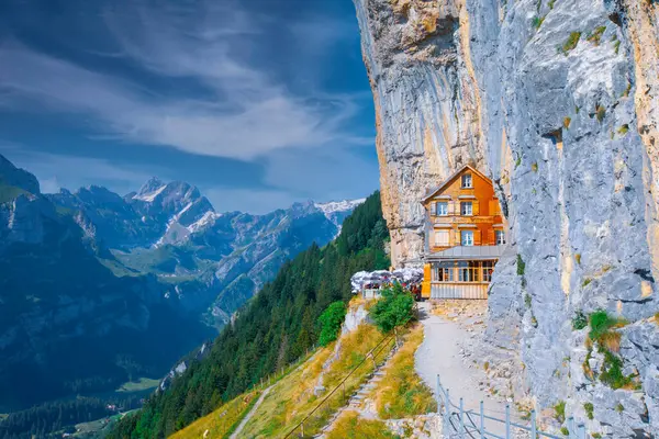 stock image The famous mountain lodge in the middle of the hiking trail, Aescher Wildkichi.