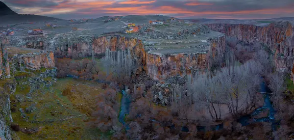stock image Famous and popular tourist attraction of Cappadocia and Turkey is the Ihlara Valley with a deep gorge and steep cliffs with hiking paths
