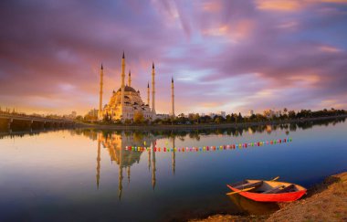 Sabanci Central Mosque (Turkish: Sabanci Merkez Cami) and Seyhan River in Adana, Turkey. Turkey's largest mosque with blue sky. clipart